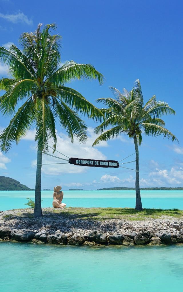 Motu with welcome sign at Bora Bora airport