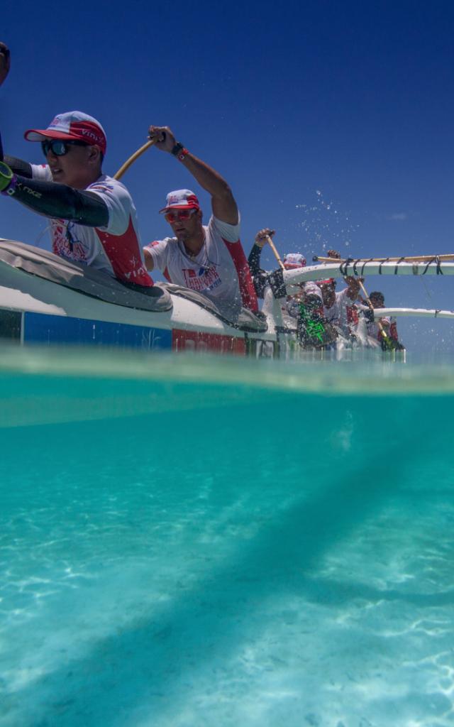 Hawaiki Nui Va’a race in the blue lagoon of Matira, Bora Bora