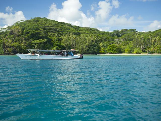 Boat on the lagoon of Huahine