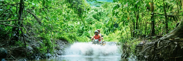 Crossing the river on a quad - Tahiti Tourisme