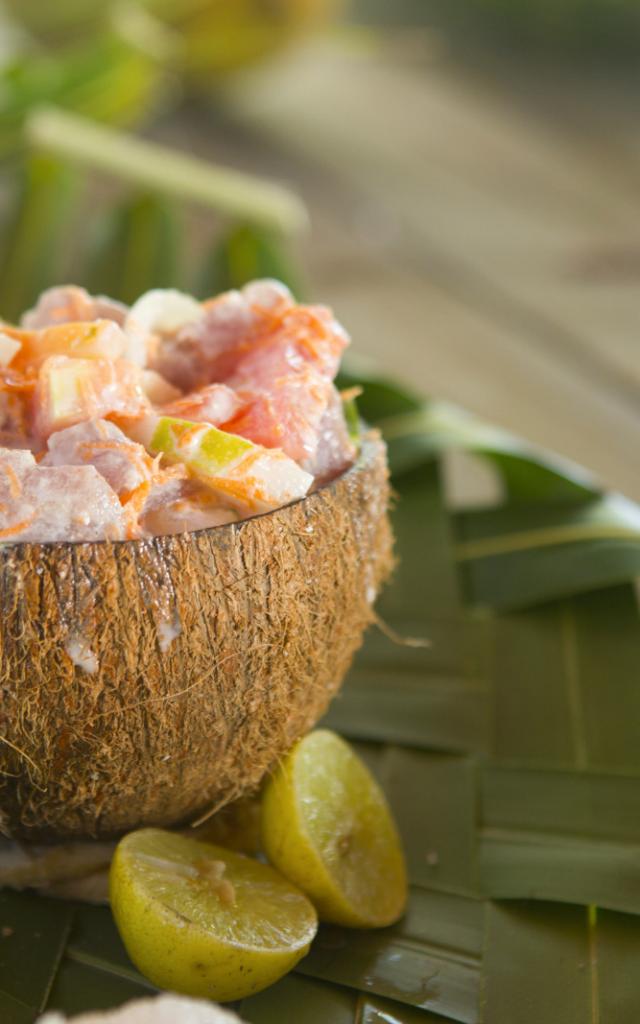 Raw fish with coconut milk in a coconut bowl