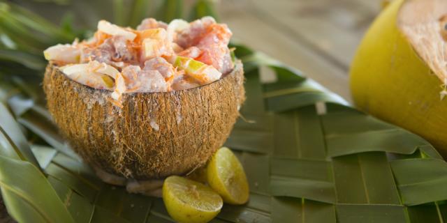 Raw fish with coconut milk in a coconut bowl