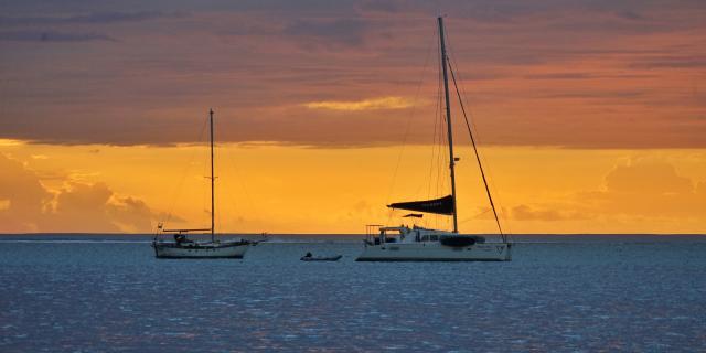 Yacht in the Lagoon at Sunset - Tahiti Tourisme © Lei Tao